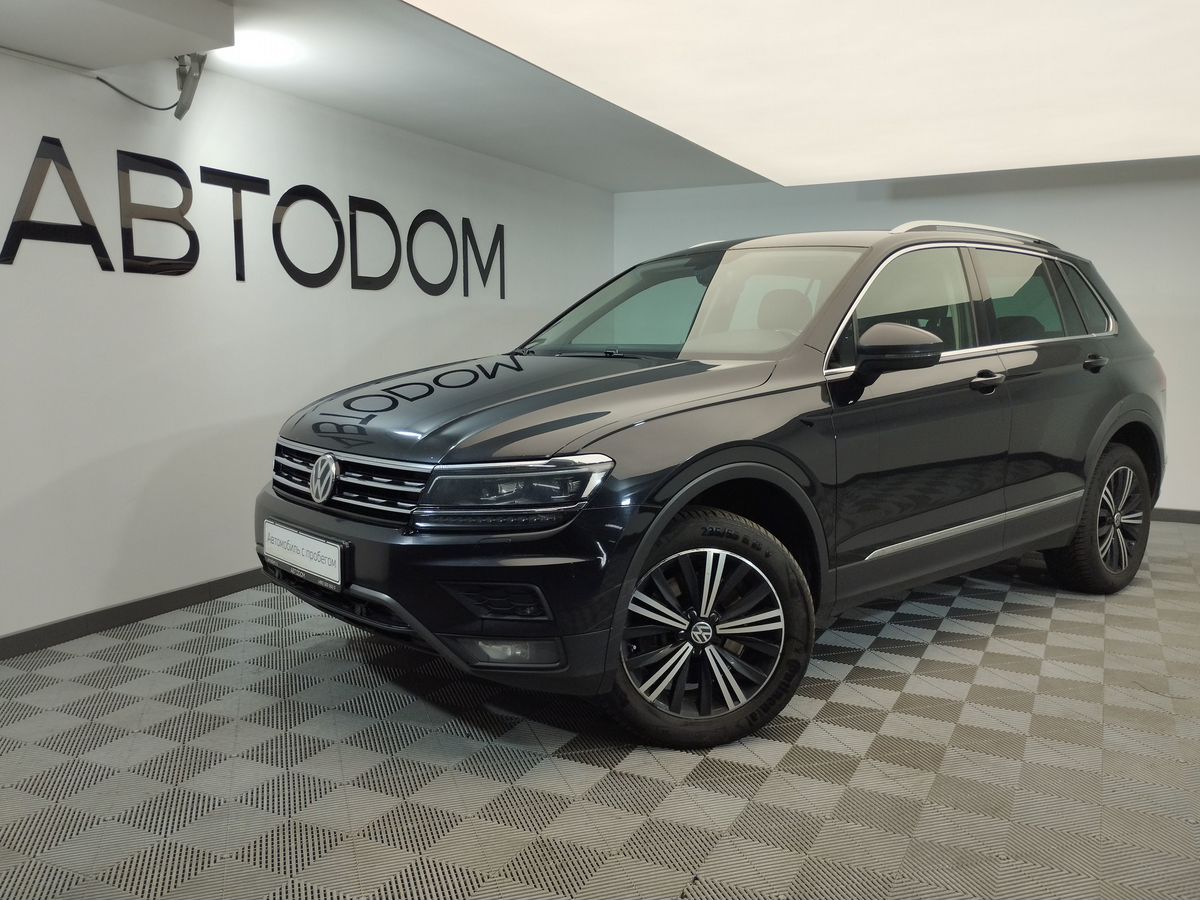 Volkswagen Tiguan Exclusive 2.0 AMT 4WD (180 л.с.) фото 1