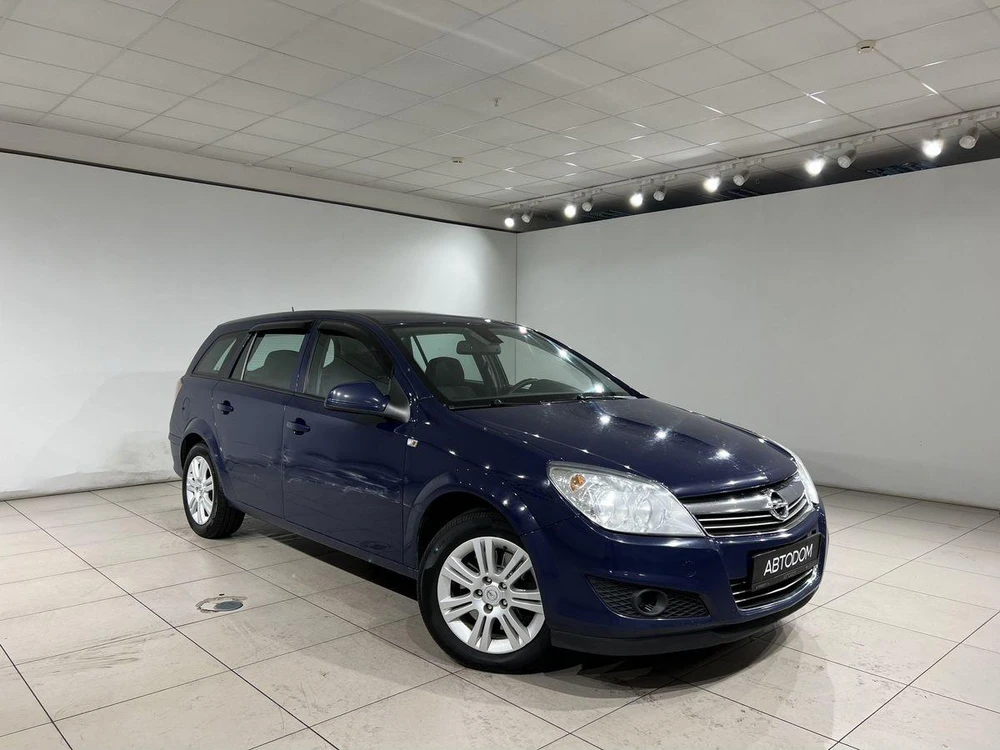 Opel Astra Enjoy 1.6 MT (115 л.с.) фото 2